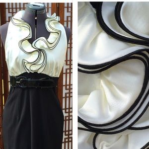 Sleeveless tailored midi dress with ruffles